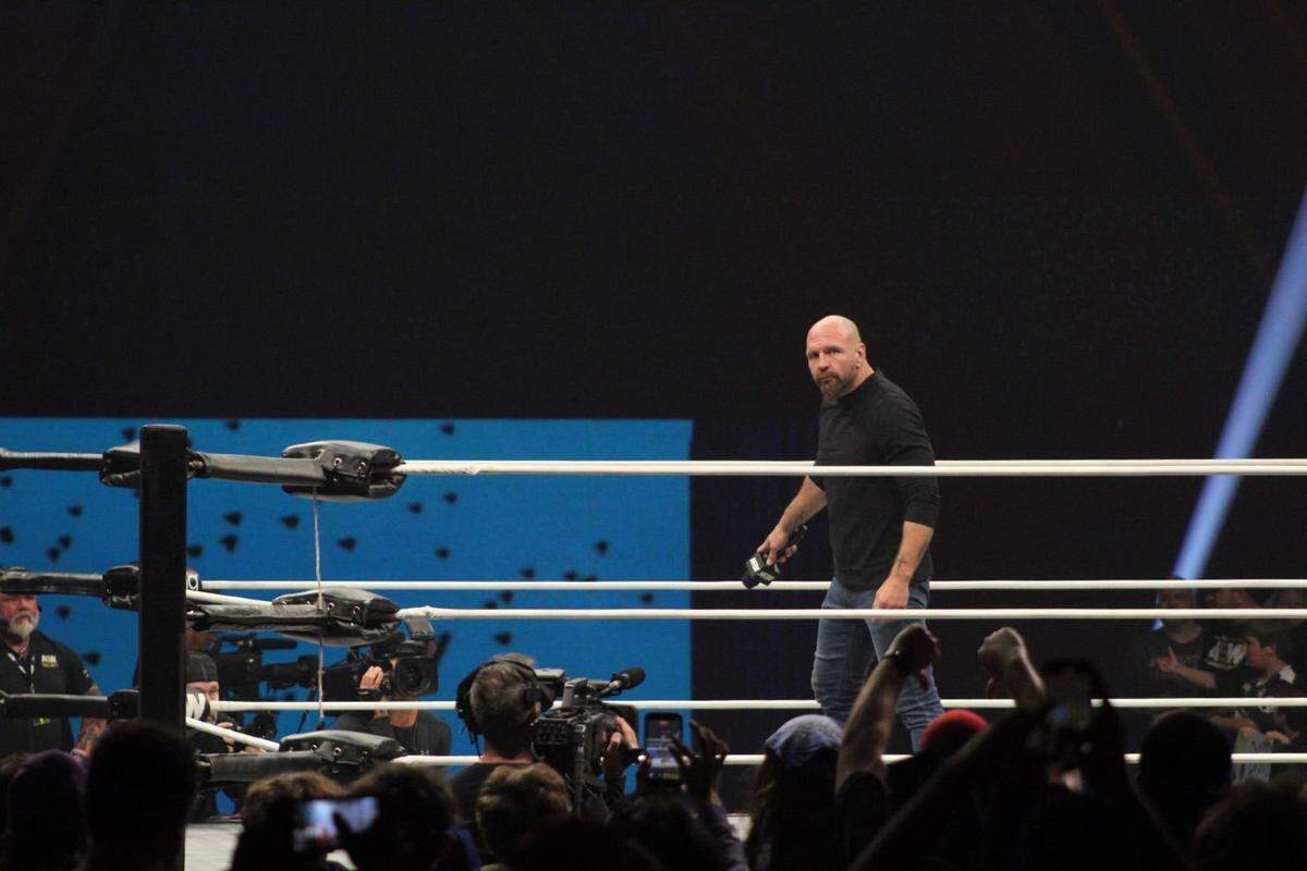 All Elite Wrestling pro wrestler Jon Moxley grabs the microphone in preparation to talk to the Cable Dahmer Arena crowd during AEW Collision Wednesday, Oct. 15. AEW ran a special live three-hour double episode of Dynamite and Collision in Independence.