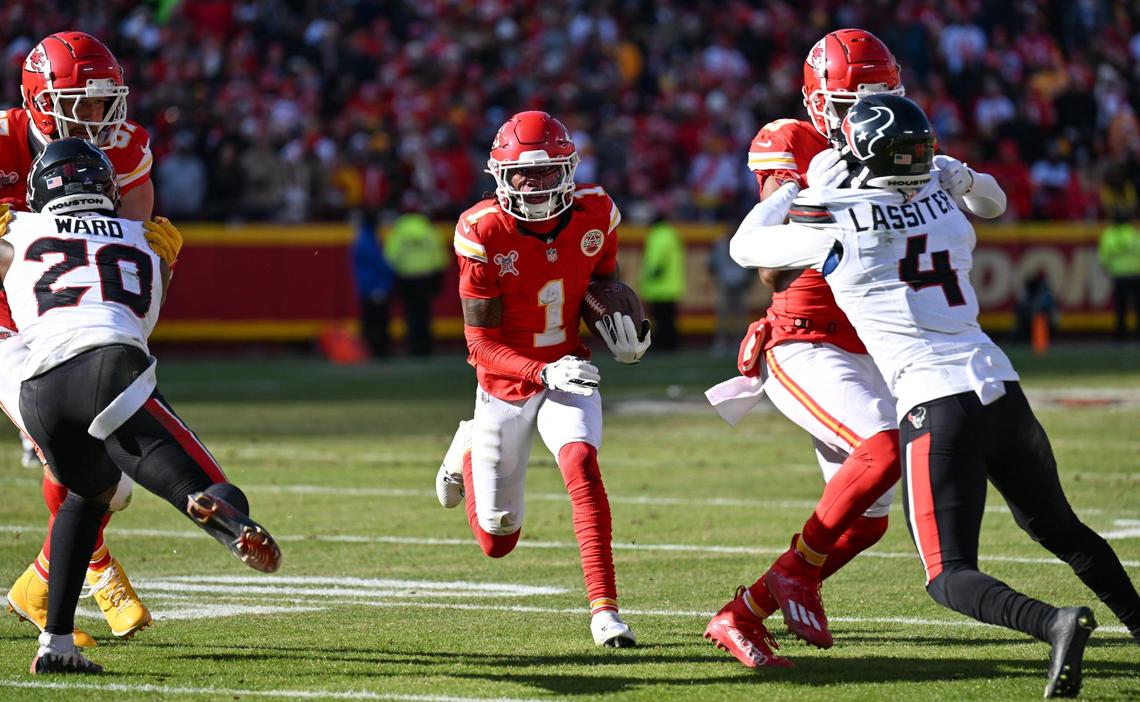 Kansas City Chiefs wide receiver Xavier Worthy (1) gains yardage against the Houston Texans in the second quarter on Saturday Dec. 21, 2024, at GEHA Field at Arrowhead Stadium.
