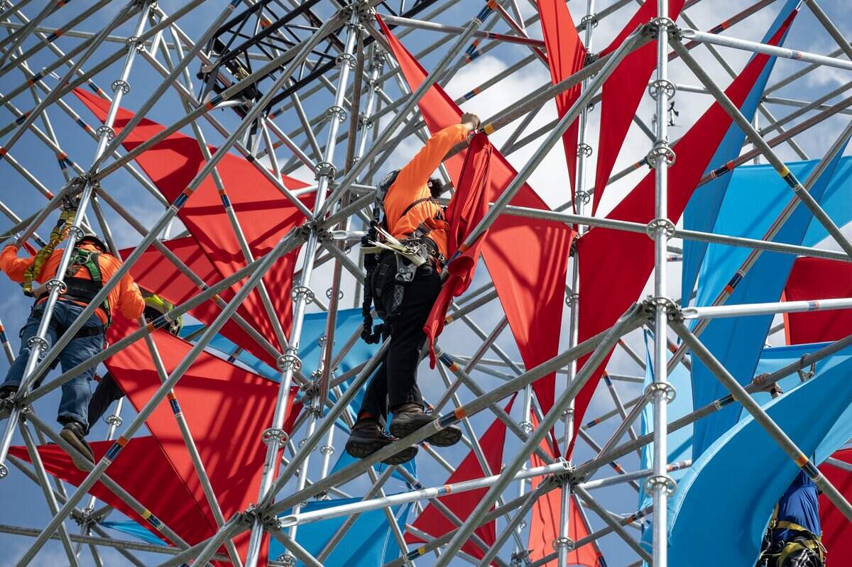 Construction crews prepare the FIFA Fan Festival site during a media walkthrough at the National WWI Museum and Memorial on Wednesday, May 27, 2026, in Kansas City.