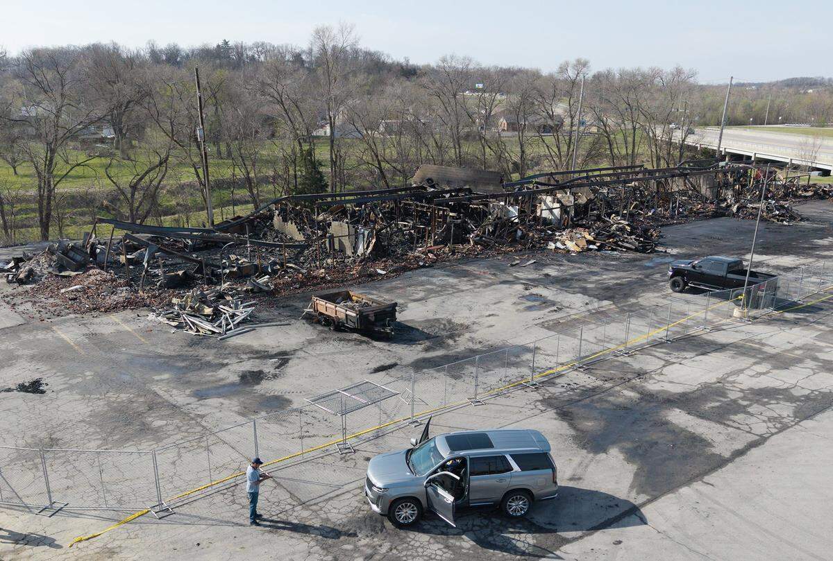 The skeletal remains of a Smithville shopping center stand in ruin on Tuesday, March 31, 2026, less than 24 hours after a massive fire destroyed five businesses. The Monday afternoon blaze destroyed Smithville's Pizza Shoppe, La Fuente Mexican Restaurant, H&R Block, Westlake Chinese Restaurant, and Lakeside Smoke.