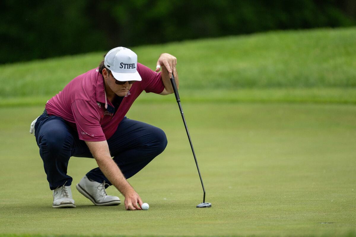 Harry Higgs of Dallas, Texas, lines up a putt during the first round of the AdventHealth Championship, a PGA TOUR-sanctioned event on the Korn Ferry Tour on Thursday at Blue Hills Country Club in Kansas City. Higgs attended Blue Valley North High School in Overland Park.