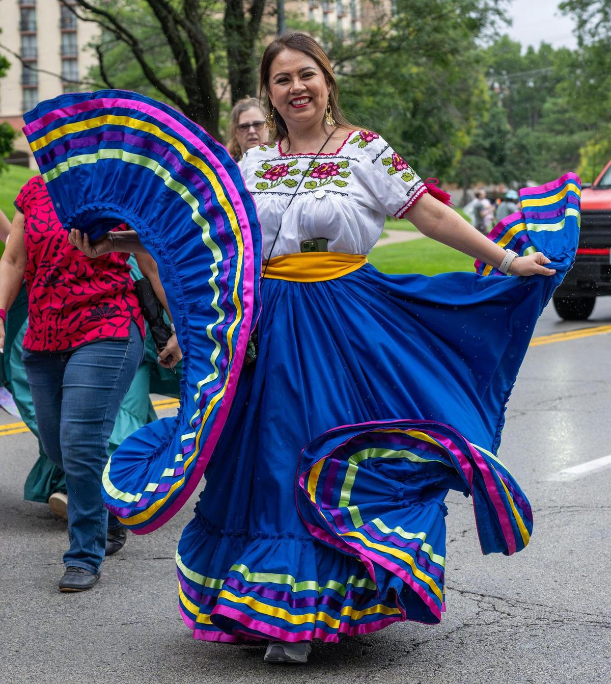 A folklórico dancer performs on Saturday, June 7, in Kansas City.