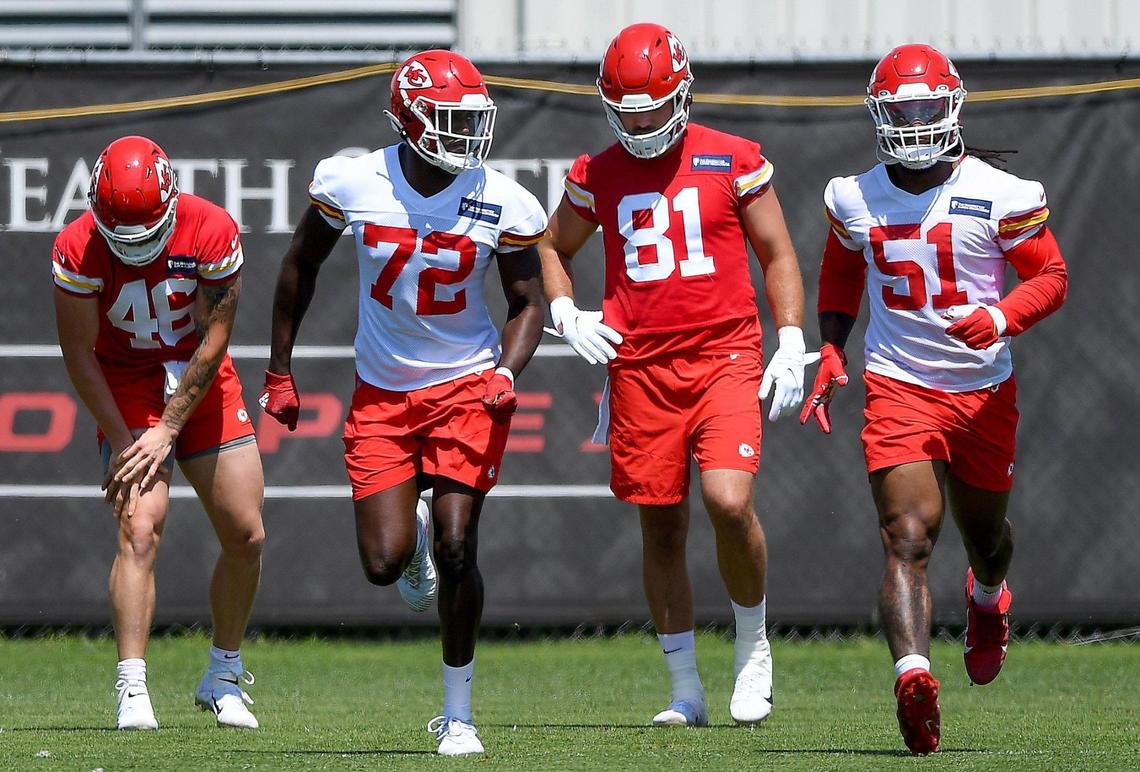 Defensive linemen Kehinde Hassan Oginni (72) and Mike Danna (51) and tight end Jordan Franks (46) and Blake Bell (81) participated in an offseason training session at the Kansas City Chiefs training facility.