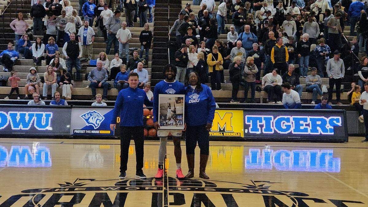 Marvies “Nette” Garrett is seen with her son Anthony Riggans at Dakota Wesleyan University’s senior night.