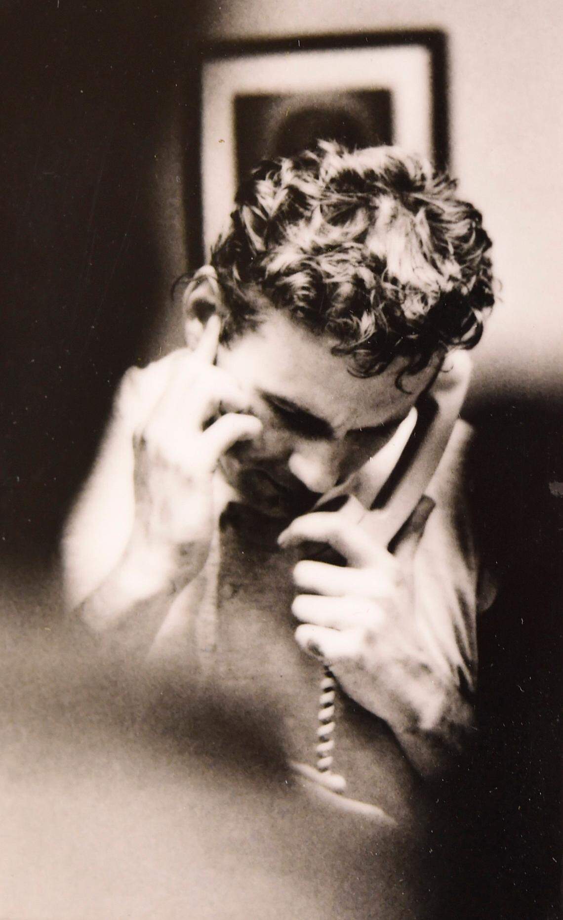 After wining the Super Bowl in 1970 against the Minnesota Vikings, Kansas City Chiefs quarterback Len Dawson takes a phone call from President Richard Nixon.