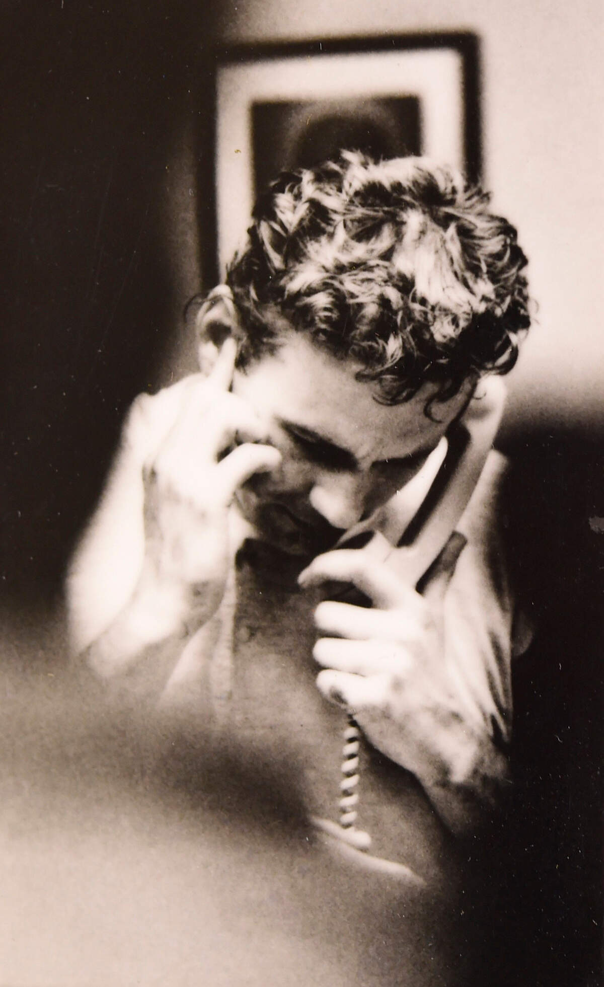 After wining the Super Bowl in 1970 against the Minnesota Vikings, Kansas City Chiefs quarterback Len Dawson takes a phone call from President Richard Nixon.