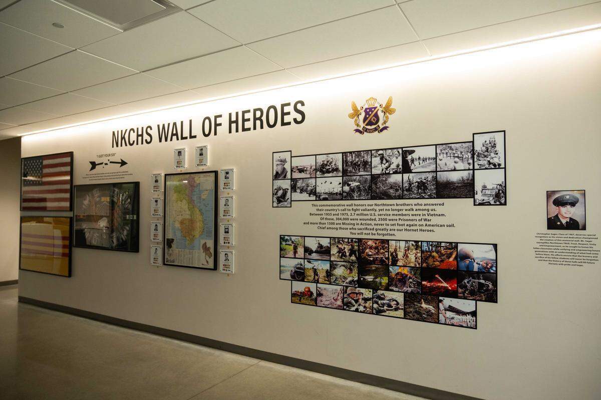 A tribute to former students that served in the military graces a wall inside North Kansas City High School on Wednesday, March 25, 2026, in North Kansas City. “Northtown” is celebrating 100 years of service to the community this year.