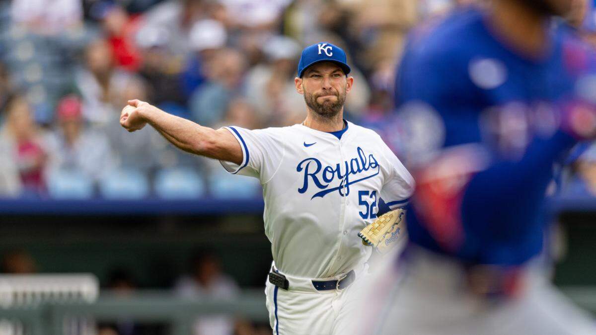 Kansas City Royals pitcher Michael Wacha (52) throws to first base during the second inning against the Texas Rangers at Kauffman Stadium on May 4, 2024.