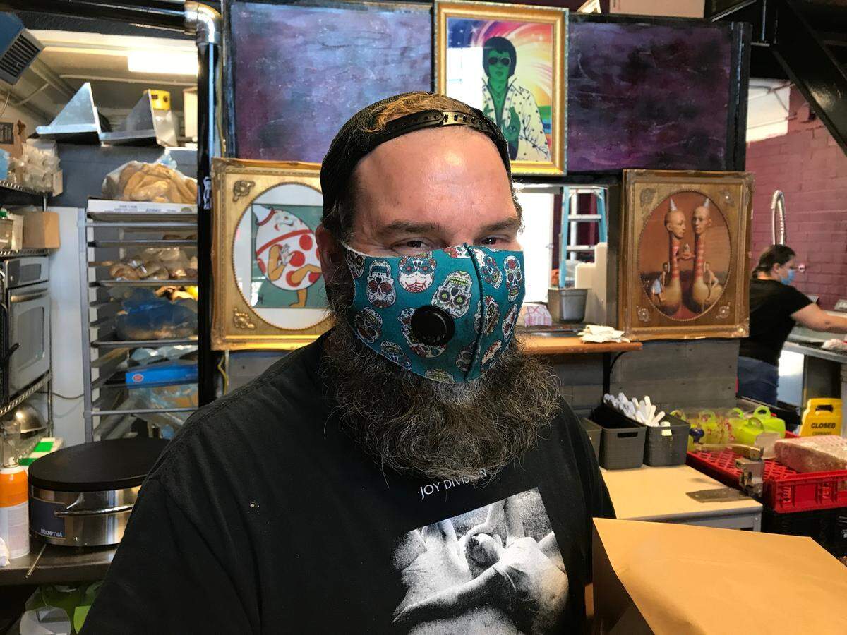 Bryan Merker, owner of the former Beignet in the City Market, has opened a new eatery, Le Chronic Cafe.