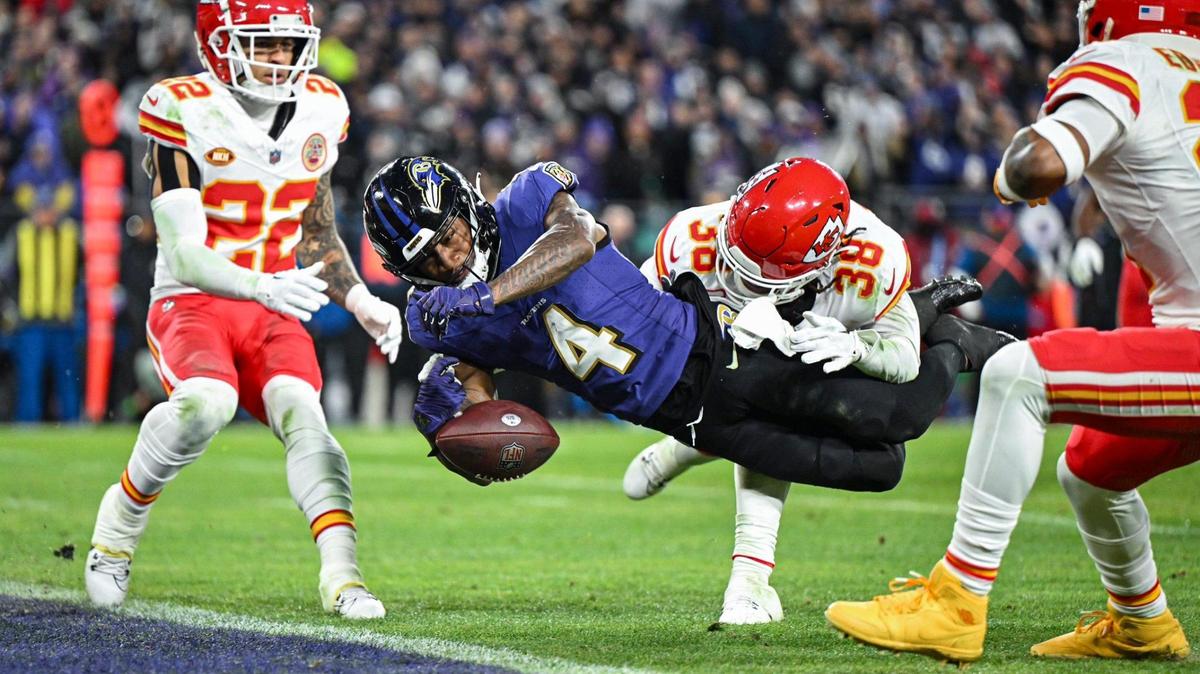 Baltimore Ravens wide receiver Zay Flowers fumbles the ball before crossing the goal line after being hit by Kansas City Chiefs cornerback L’Jarius Sneed (38) in the second half Sunday, Jan. 28, 2024, during the AFC Championship Game in Baltimore.