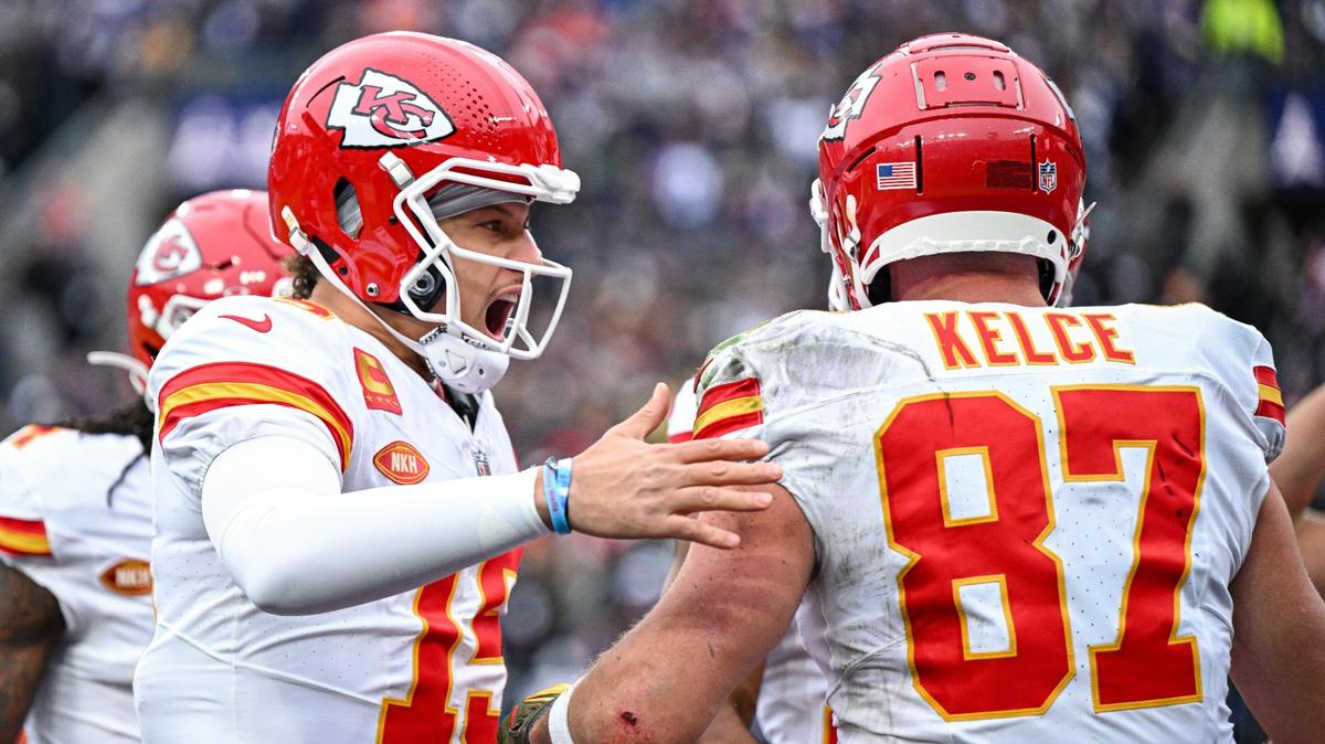 Kansas City Chiefs quarterback Patrick Mahomes (15) celebrates with tight end Travis Kelce (87) after Kelce pulled in a catch for touchdown in the first quarter against the Baltimore Ravens Sunday, Jan. 28, 2024, during the AFC Championship Game in Baltimore.