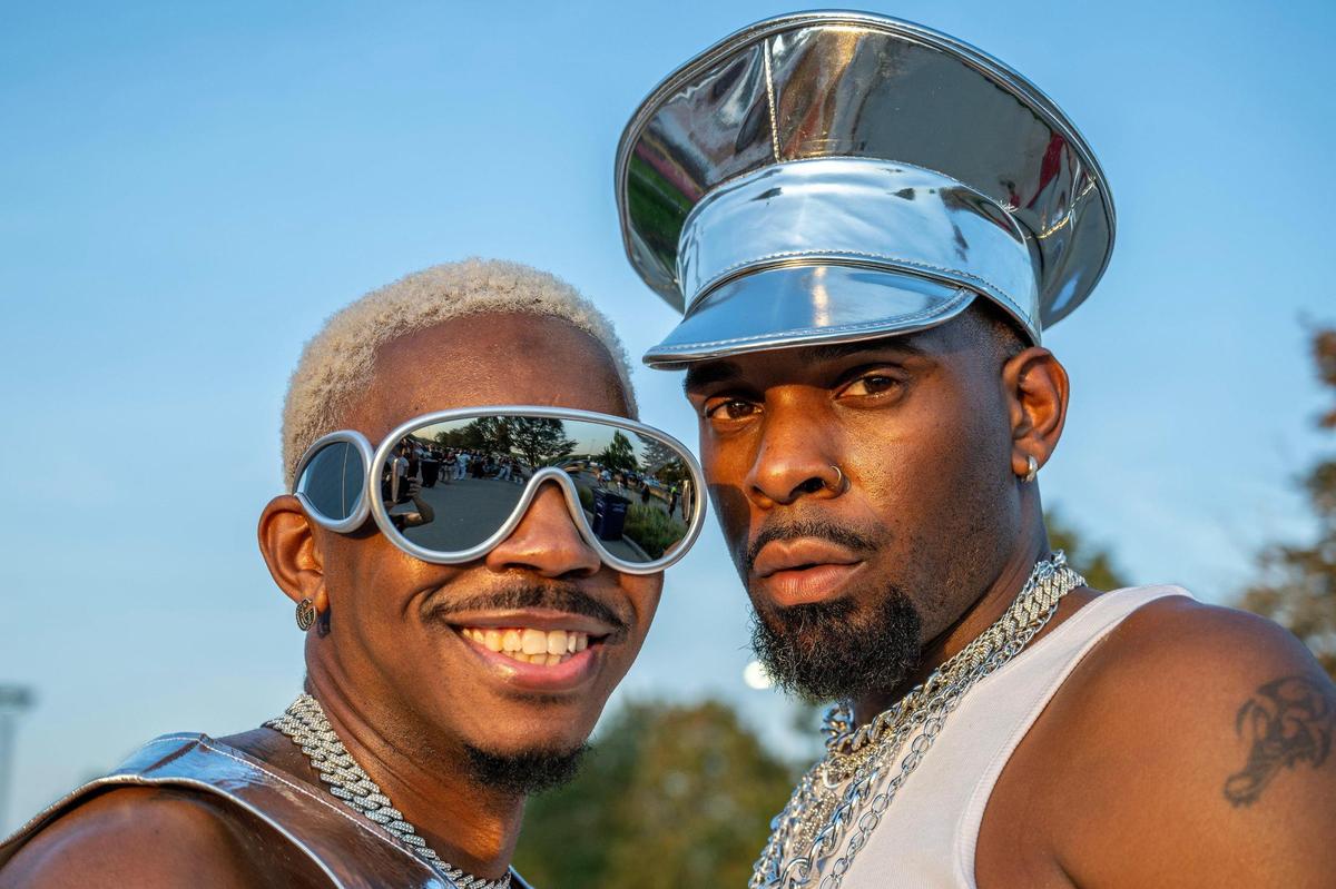 Larry Buck-Cooper, left and his husband Melvin, from Washington D.C., show off their matching silver outfits before attending the last stop of Beyoncé’s Renaissance World Tour at GEHA Field at Arrowhead Stadium on Sunday, Oct. 1, 2023, in Kansas City.