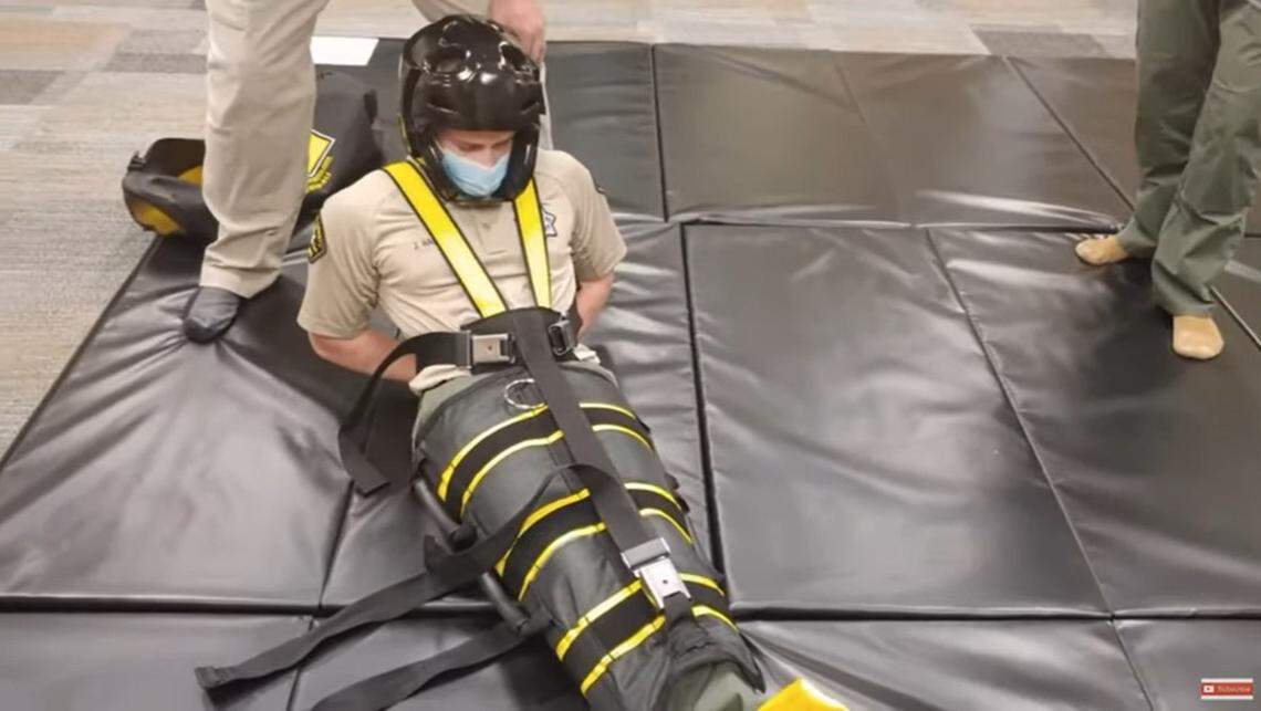 Lofton was put into a “wrap” restraint, demonstrated here by the manufacturer of one brand.