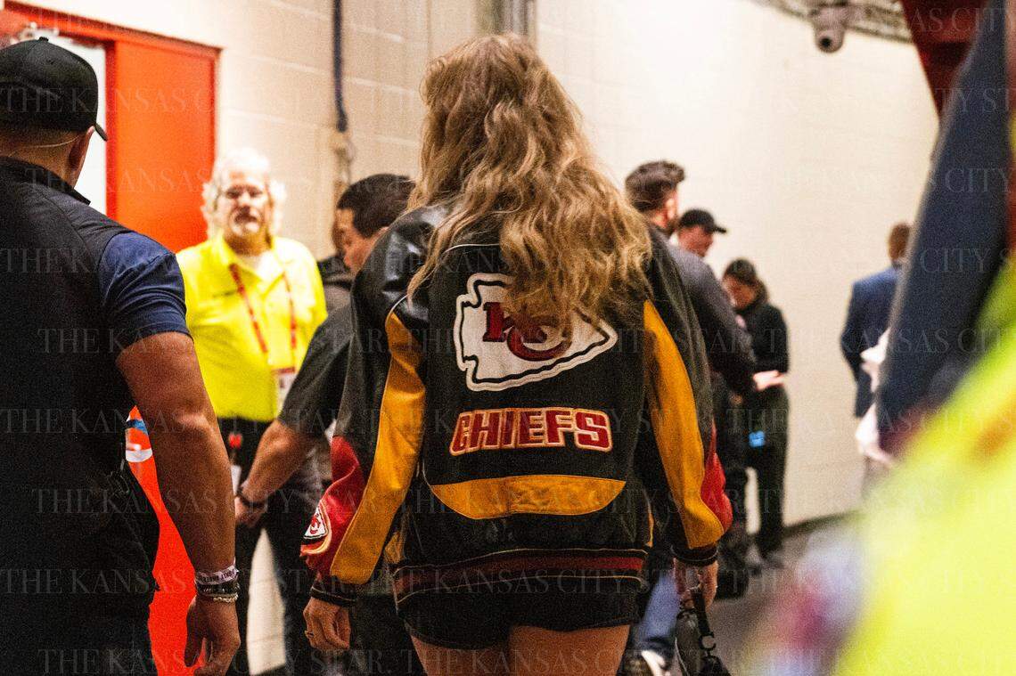 Pop star Taylor Swift is escorted by security to attend an NFL game between the Kansas City Chiefs and Tampa Bay Buccaneers on Monday, Nov. 4, 2024, at GEHA Field at Arrowhead Stadium.
