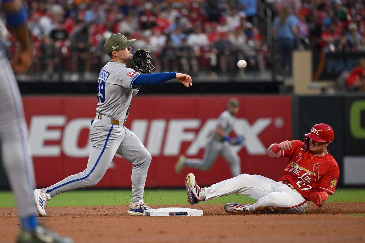 Kansas City Royals second baseman Michael Massey turns a double play against the Cardinals at Busch Stadium in St. Louis on Friday, May 15, 2026.