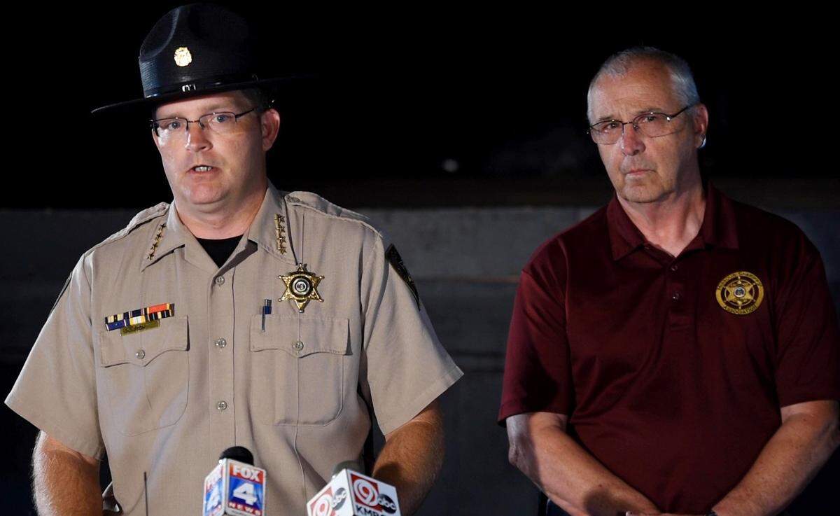 Clinton County Sheriff Larry Fish, left, and Collaway County Sheriff Jerry Galloway, right spoke during the investigation of the Diemel brothers’ disappearance.
