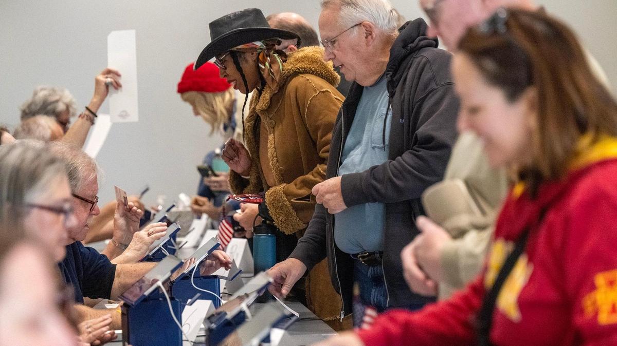 Within minutes of the doors opening, election workers were handling the large turnout of Johnson County residents arriving for the first day of in-person advance voting for the 2024 General Election at The Arts and Heritage Center in Overland Park on Saturday, Oct. 19.
