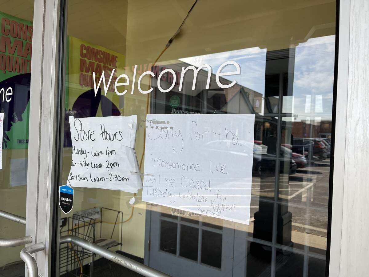 Outside Waldo Cafe Wednesday morning, where a sign said it would be closed Tuesday for renovations. A sign on the other door cited its Fourth of July hours.