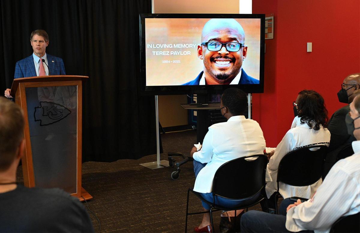 Clark Hunt, Chairman and CEO of the Kansas City Chiefs, paid tribute to sports journalist Terez A. Paylor, whose family looked on, during a ceremony Friday, Aug. 27, at Arrowhead Stadium in Kansas City. The Chiefs retired Paylor’s press box seat and presented a $10,000 check to the Terez A. Paylor Scholarship at Howard University