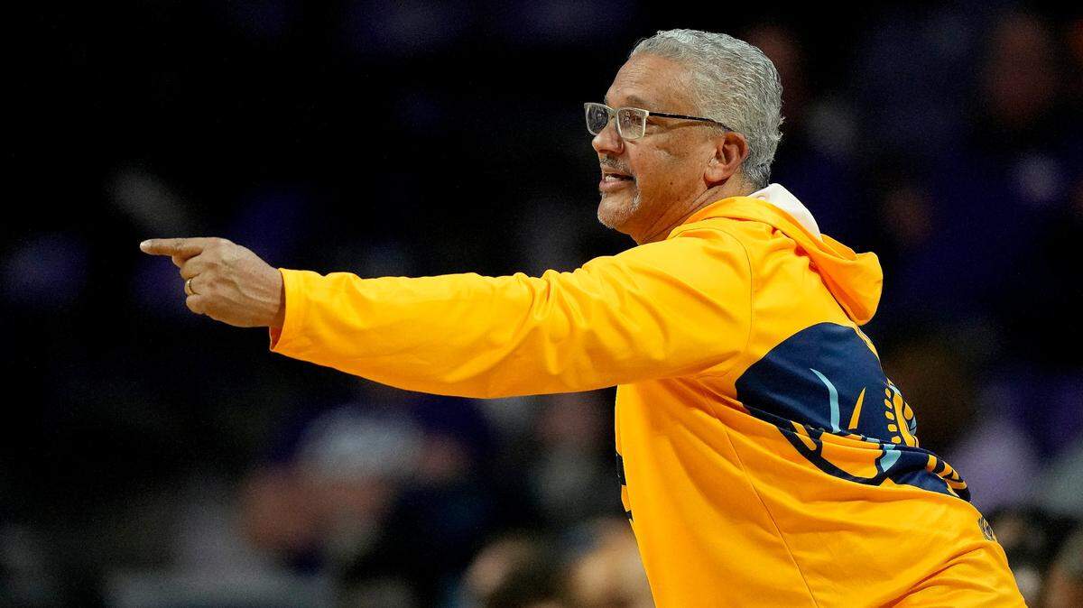 Kansas City head coach Marvin Menzies talks to his players during the second half of an NCAA college basketball game against Kansas State on Nov. 17, 2022, in Manhattan, Kan.