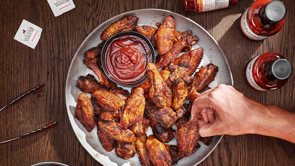 Jack Stack’s wings are rubbed with its signature sauce and grilled over a hickory-wood flame for three or four hours.