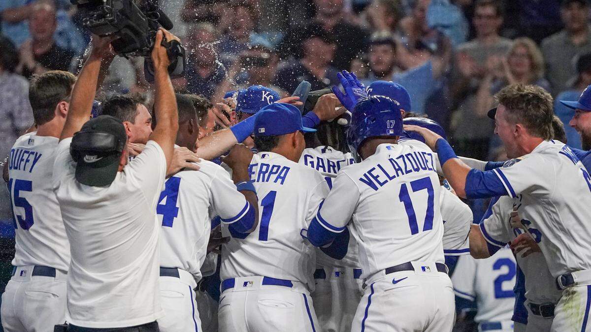 The Kansas City Royals celebrate after a walk-off balk against the Chicago White Sox at Kauffman Stadium in Kansas City on Sept. 5, 2023.