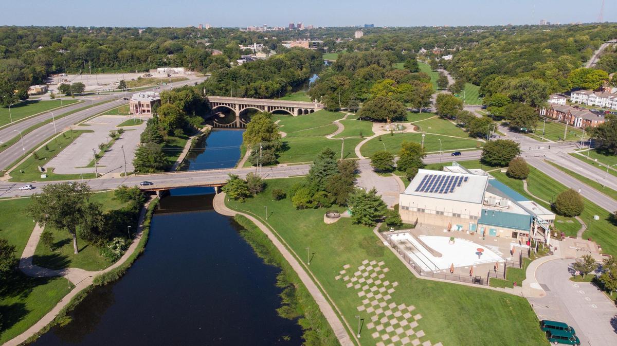 Aerial shot shows Brush Creek Community Center and the Spirit of Freedom Fountain on the right, and Bruce R. Watkins Cultural Center across Brush Creek. Blue Parkway, to the left, together with Swope Parkway and Volker Boulevard, would be renamed Martin Luther King Jr. Boulevard under a proposal city officials are considering.