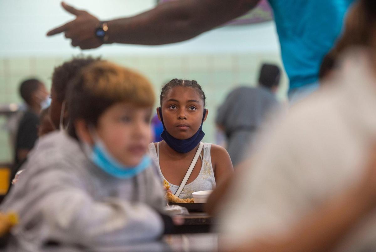 Kansas City area districts are deciding how to begin the school year next month as COVID-19 cases surge.