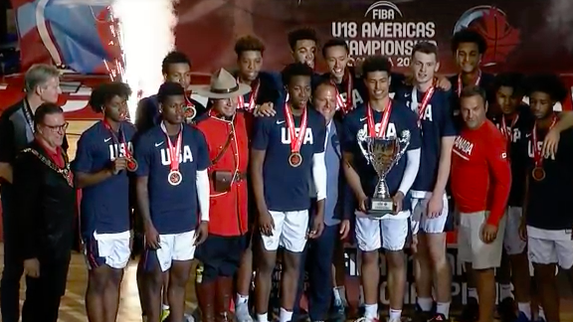 Kansas recruit Josiah James, back row and far left, stands behind teammates during the championship trophy ceremony following Team USA's 113-74 victory over Canada in the gold-medal game of the FIBA Americas U18 Championships in St. Catharines, Canada. Bill Self coached the team to a 6-0 record.