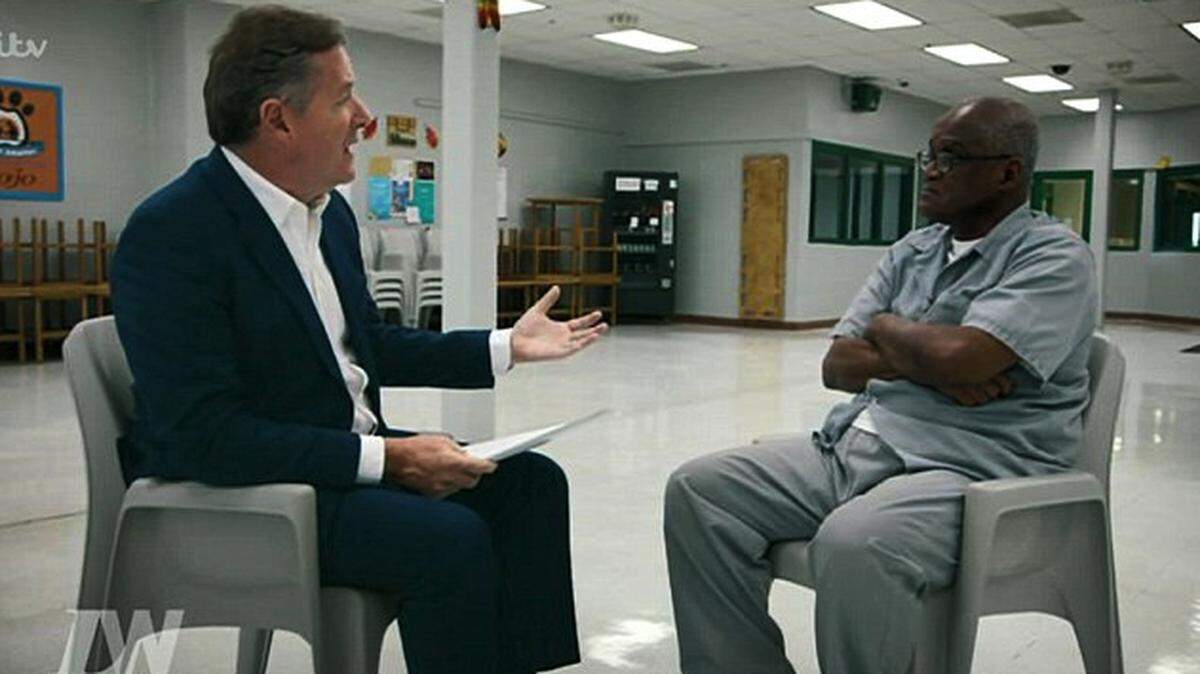 In his first interview since being convicted in 2007 of killing six Kansas City women, Lorenzo Gilyard, right, tells British interviewer Piers Morgan that he is innocent of the crimes.