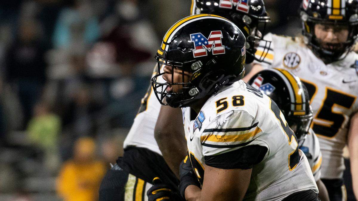 Missouri defensive lineman Mekhi Wingo (58) exclaims after making a tackle in the second half of the Armed Forces Bowl NCAA college football game in Fort Worth, Texas, Wednesday, Dec. 22, 2021. (AP Photo/Emil Lippe)