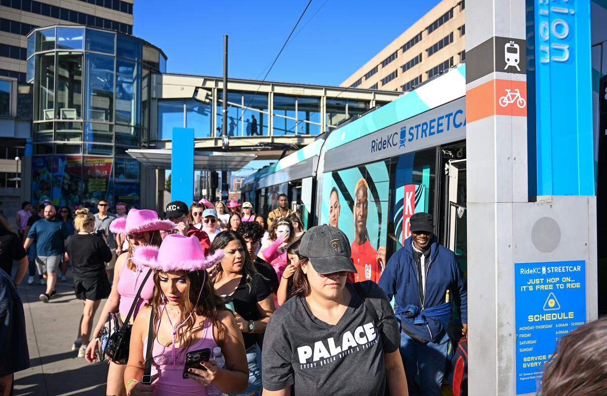 Fans file off of the KC Streetcar at the Union Station stop to head to the Chappell Roan concert on Saturday, Oct. 4, 2025, at the National WWI Museum and Memorial in Kansas City.
