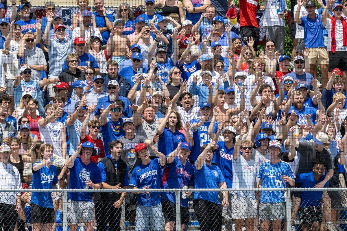 Kansas Jayhawks fans cheer during the seventh inning against the Northeastern Huskies in an NCAA baseball tournament game at Hoglund Ballpark on Friday, May 29, 2026, in Lawrence.