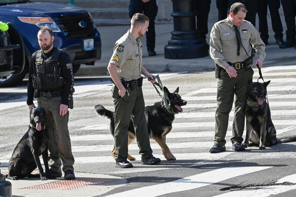 Law enforcement officers and their K9 partners stood during the funeralfor fallen Kansas City Police Officer James Muhlbauer, 42, and his police K-9, Champ, Wednesday, Feb. 22, 2023, at Municipal Auditorium in Kansas City. The officer and K9 were hit and killed when a driver, traveling at a high rate of speed, allegedly ran a red light at Benton Boulevard and E. Truman Road and plowed into the officer’s patrol car on Wednesday, Feb. 15, 2023.