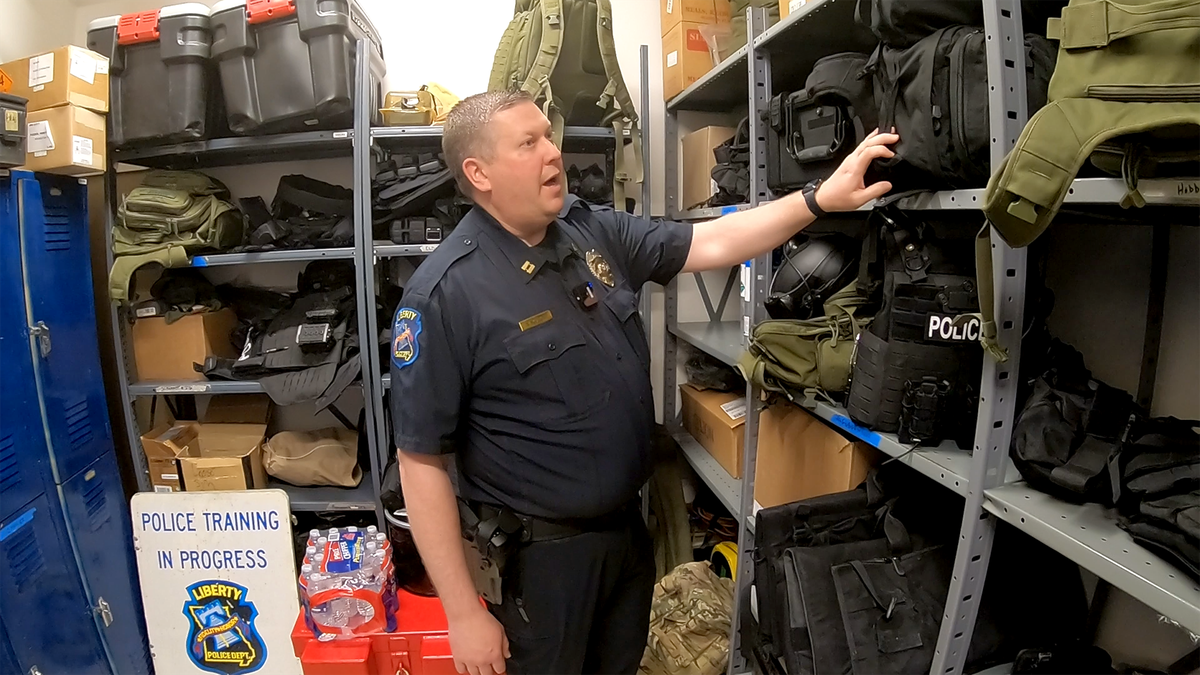 Captain Nathan Mulch of the Liberty Police Department tours a closet used by the SWAT team to store equipment. On April 8, Liberty voters will decide on a one-cent sales tax increase to support first responders. If approved, the tax would generate $7.5 million for salaries, a police facility expansion, and future equipment purchases.