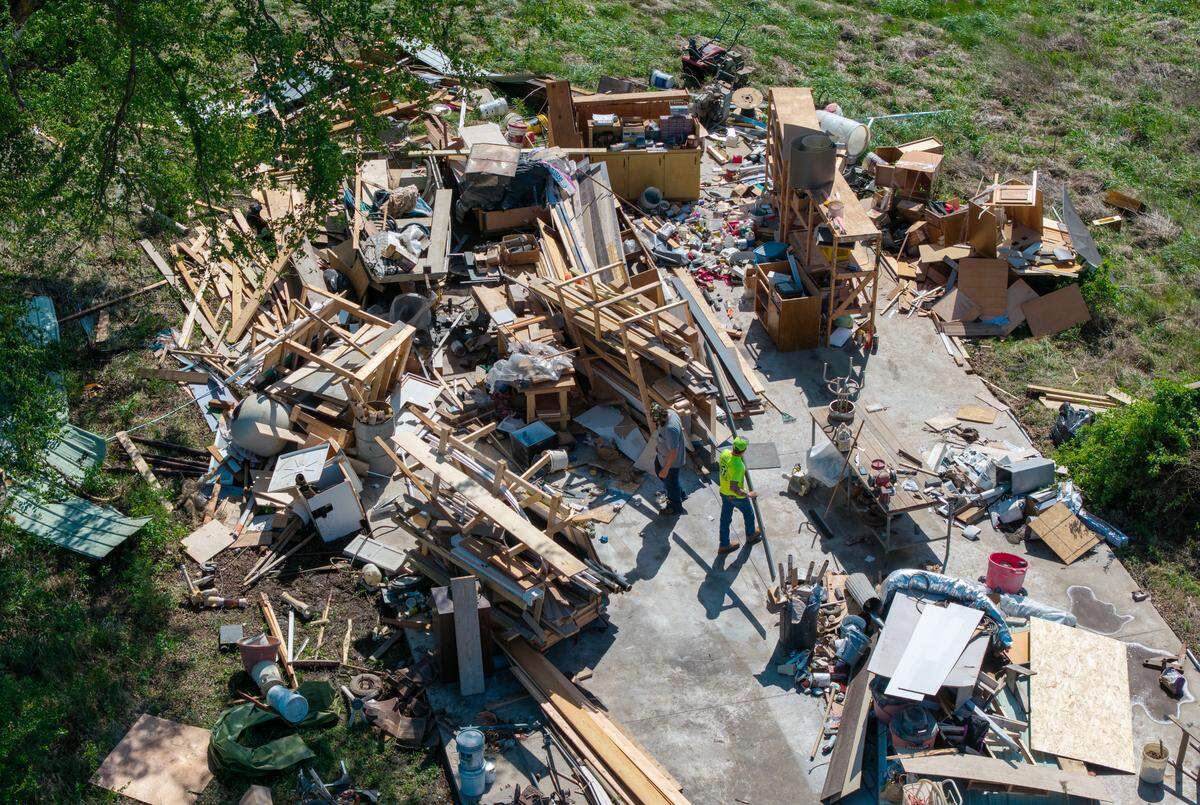 Cleanup efforts were underway in Clinton, Missouri after a tornado ouched down Wednesday in Henry County. Crews were sorting through the remains of the storage building located behind American Building Products on South Second Street on Thursday, April 16, 2026.