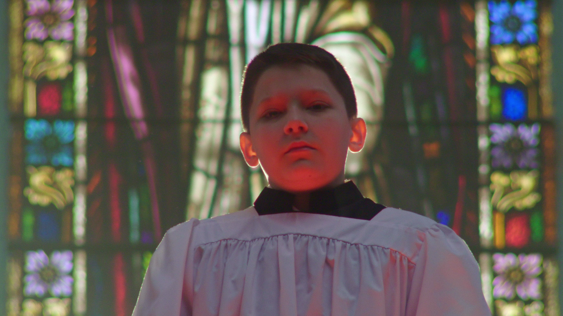 The six men who tell their stories of abuse in the documentary “Procession” decided to cast the same young actor, Terrick Trobough, to portray them in their boyhood years, “because we’re all that one boy,” one of the men said.