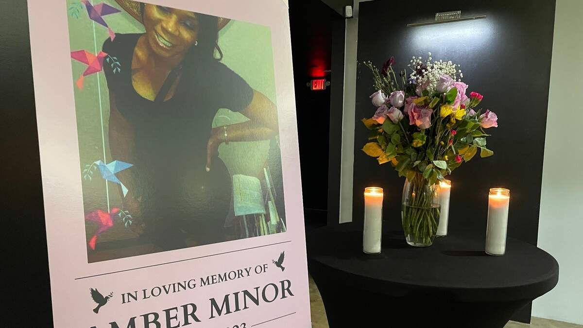 Close friends of Amber Minor, 40, who was found dead on Christmas Eve morning, gathered in Kansas City Saturday evening to remember her.