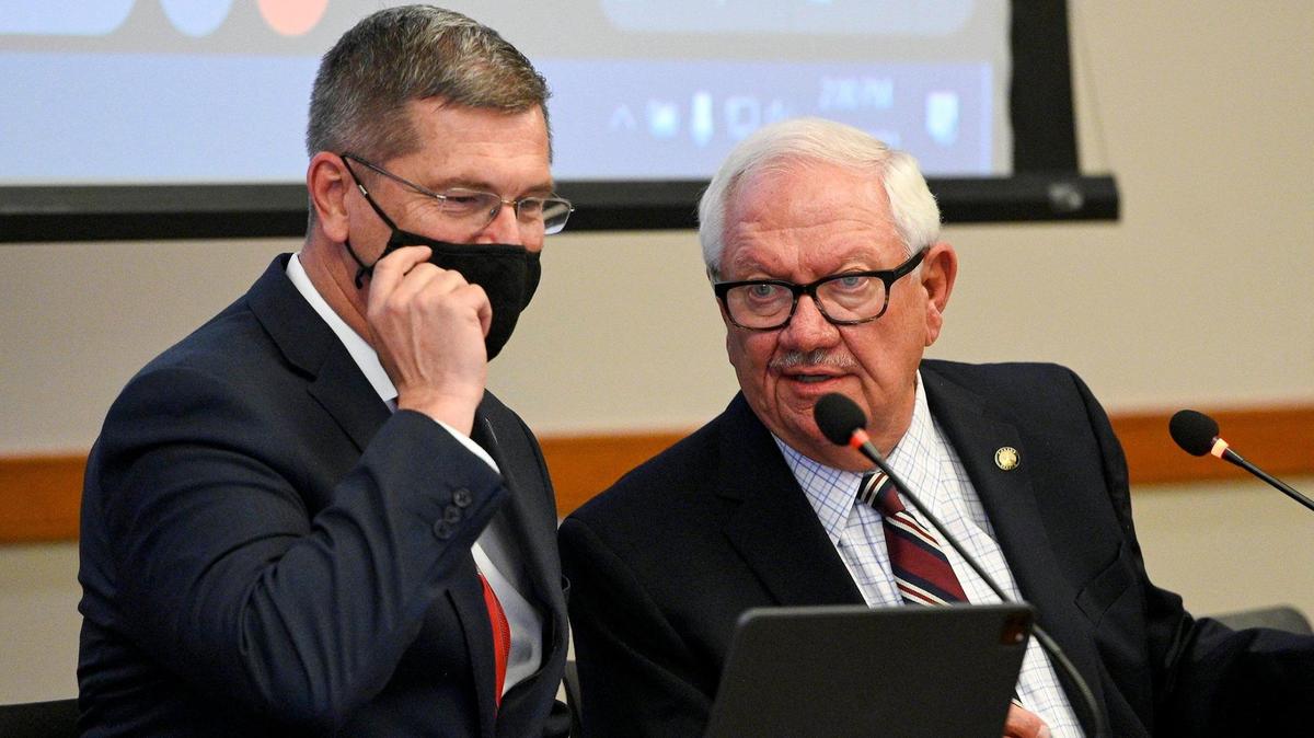Kansas state Rep. Chris Croft, left, and Rick Wilborn, Senate vice president, talked before the start of a town hall on redistricting at the Matt Ross Community Center in Overland Park last year.