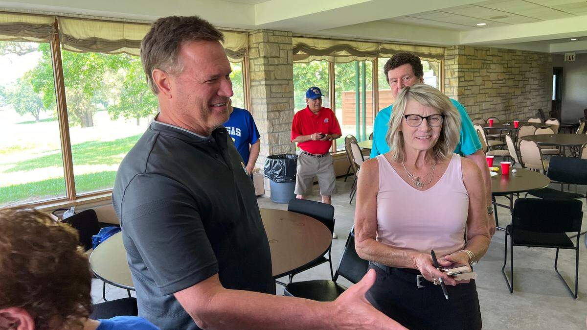KU men’s basketball coach Bill Self visits with attendees at Monday’s 21st annual Otto Schnellbacher golf outing in Topeka.