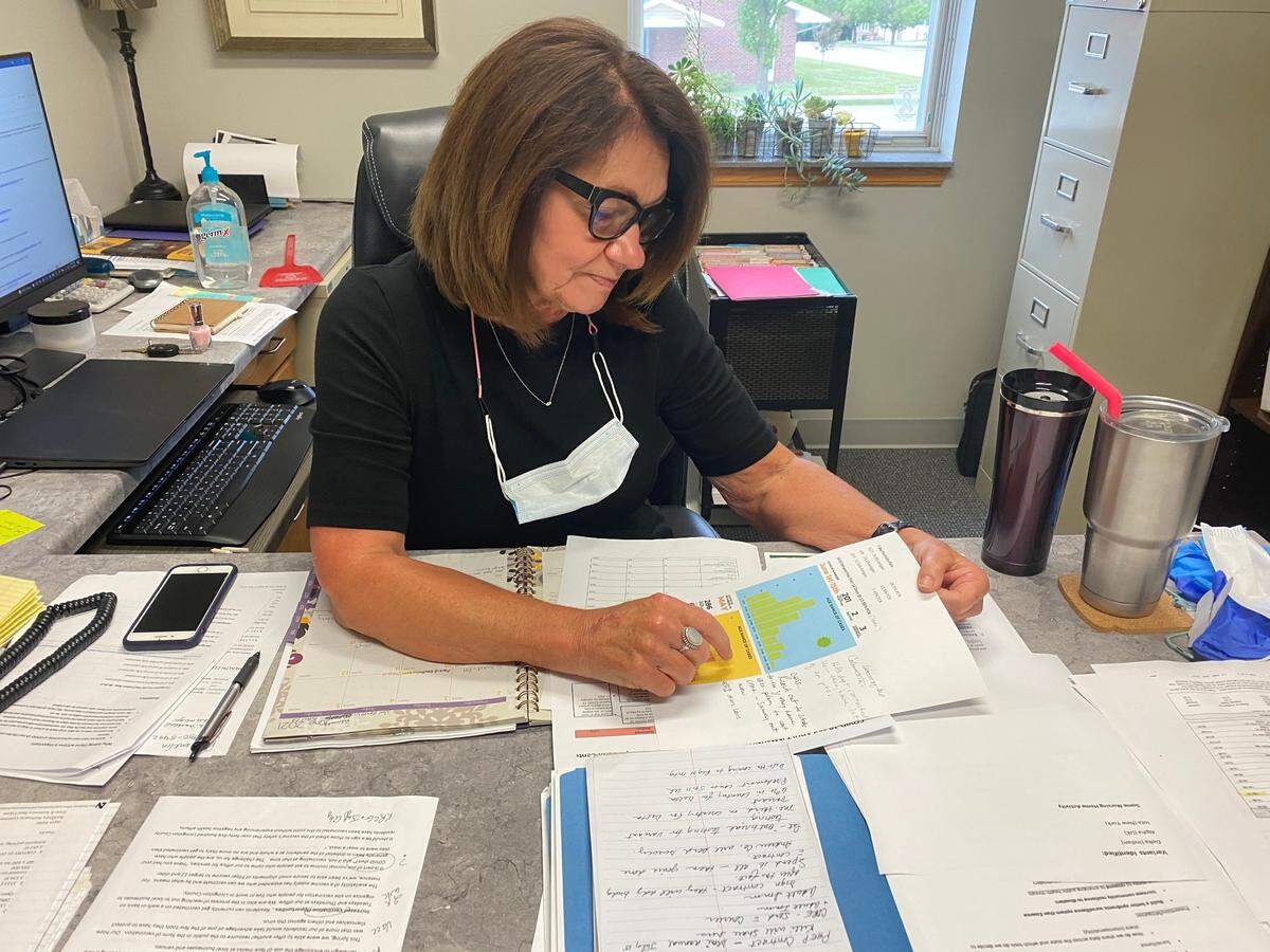Sherry Weldon, administrator of the Livingston County Health Center, goes over the county’s COVID-19 infection rates for May and June 2021. The county is one of several rural ones in Missouri that have seen spikes in infection and low vaccination rates.