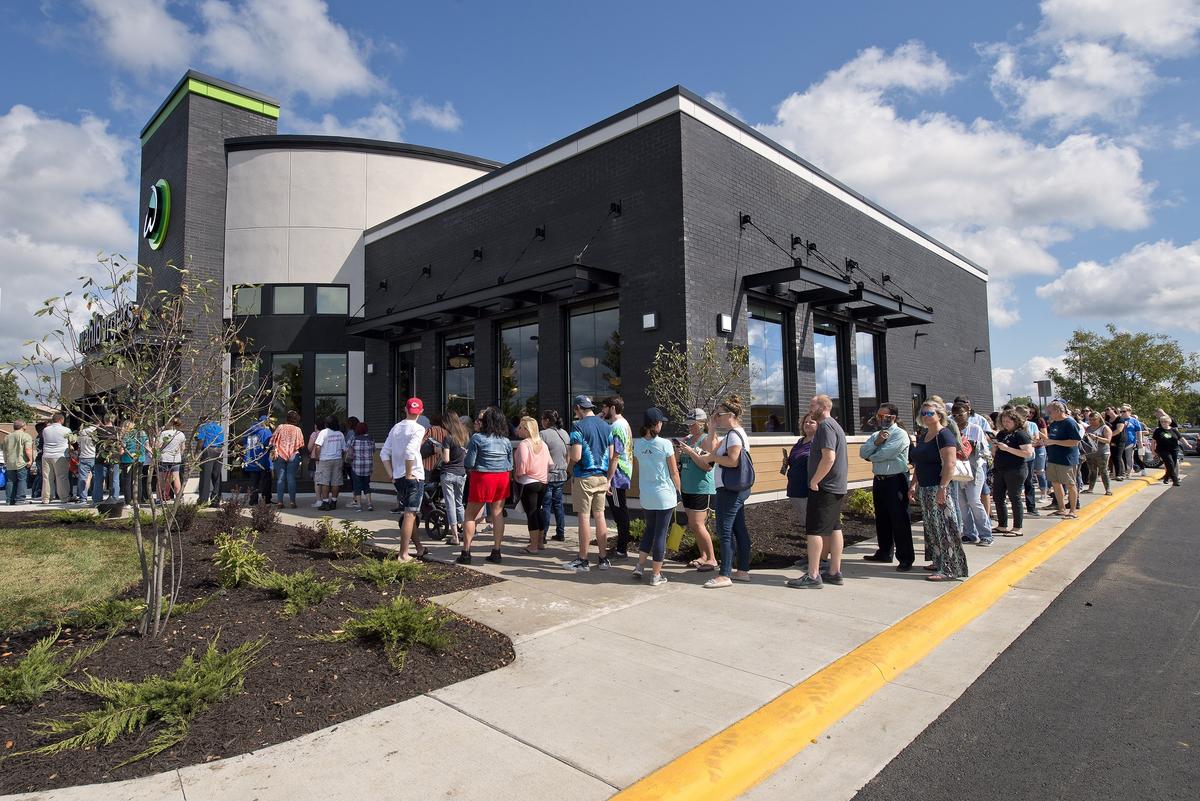 The line stretched around the restaurant for the 11 a.m. opening Tuesday.