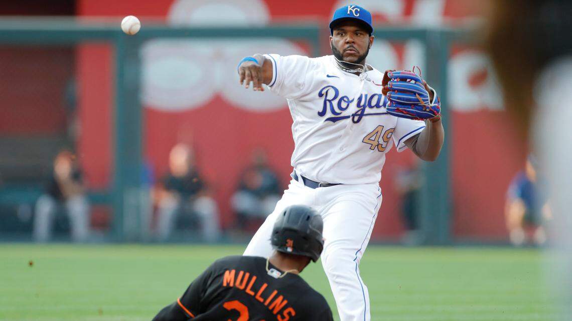 Baltimore Orioles’ Cedric Mullins (31) is out at second base as Kansas City Royals second baseman Hanser Alberto (49) throws to first for a double play in the first inning of a baseball game at Kauffman Stadium in Kansas City, Mo., Friday, July 16, 2021. (AP Photo/Colin E. Braley)