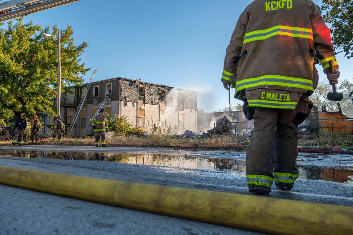 Firefighters battle a fire at an abandoned apartment complex on Thursday at 2409 Mill Street in Kansas City, Firefighters battled a blaze at the same apartment complex on Wednesday.