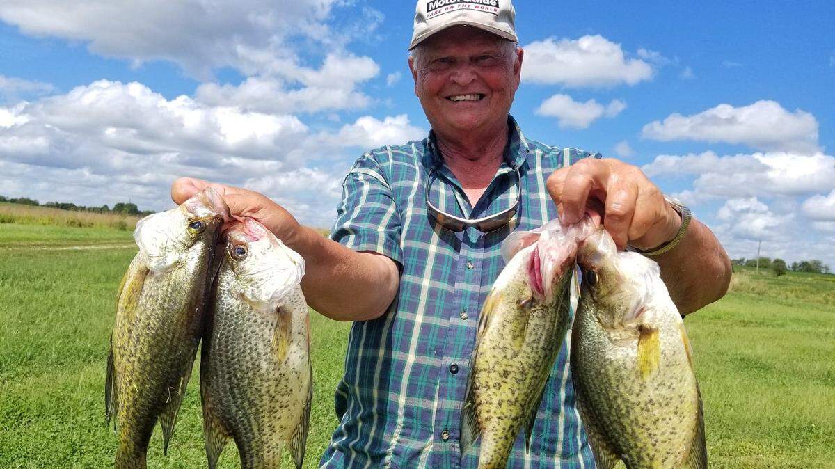 Clinton, Mo.-area resident Denny Hartmann with some one-pound black crappie caught near Truman Lake while spider-rigging with minnows.