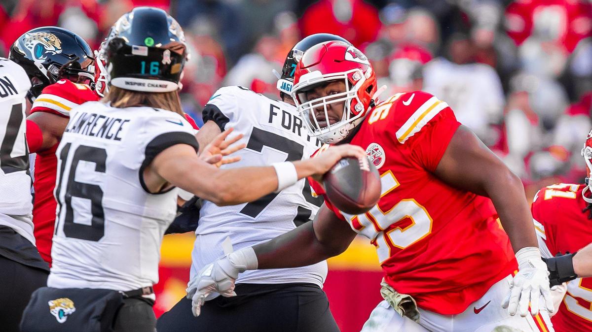 Kansas City Chiefs defensive tackle Chris Jones (95) applies pressure to Jacksonville Jaguars quarterback Trevor Lawrence (16) during the game between the Kansas City Chiefs and the Jacksonville Jaguars on Sunday November 13, 2022 at Arrowhead Stadium in Kansas City, Missouri.