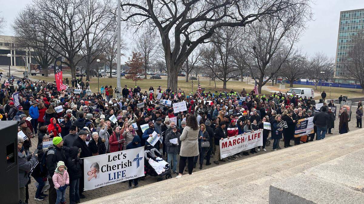 Anti-abortion activists gather at the steps of the Kansas State Capitol at the March for Life rally, Jan. 24, 2023.