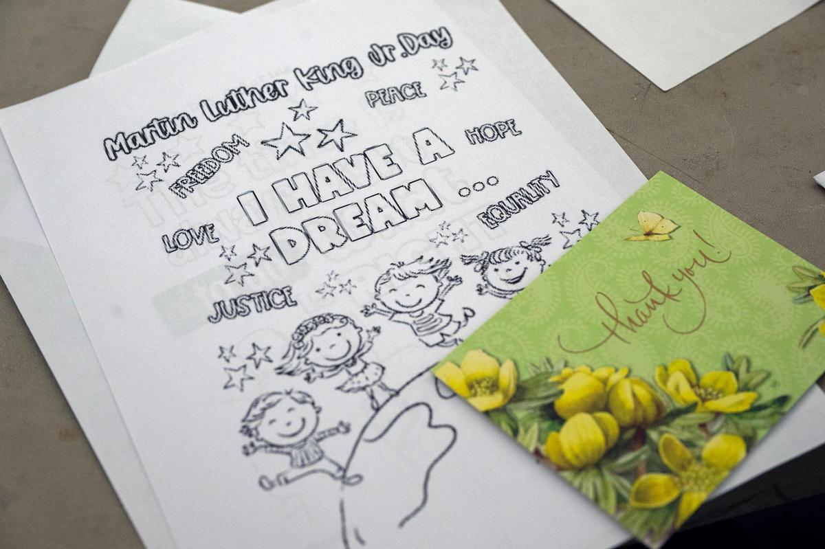 Thank you cards and cards of encouragement for veterans, students and neighbors facing food insecurity were written by volunteers during the YMCA MLK Day of Service on Monday, Jan. 20, 2025, at the Cleaver Family YMCA in Kansas City.