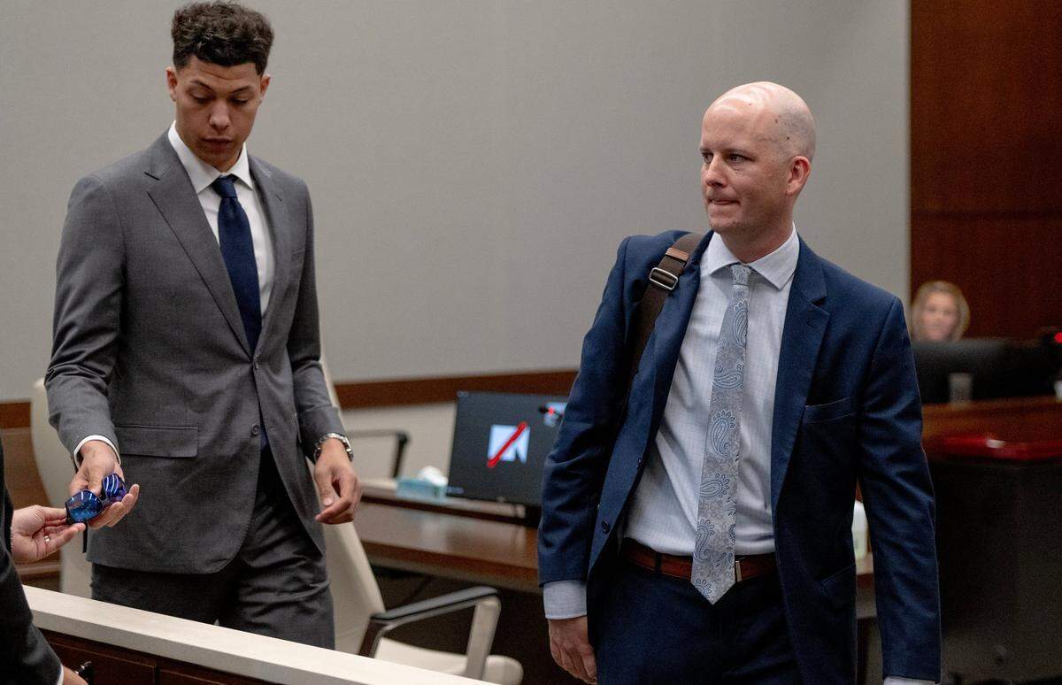 Jackson Mahomes and his attorney, Brandan Davies, leave the courtroom following a bond motion hearing in Johnson County District Court on Tuesday, May 16, 2023, in Olathe.