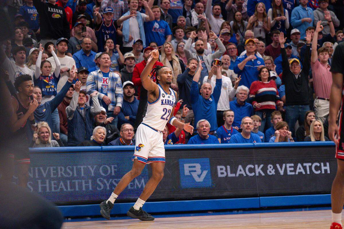 Kansas Jayhawks guard Darryn Peterson (22) shoots a 3-pointer in the second half vs. the Houston Cougars on Monday, February 23, 2026, at Allen Fieldhouse.